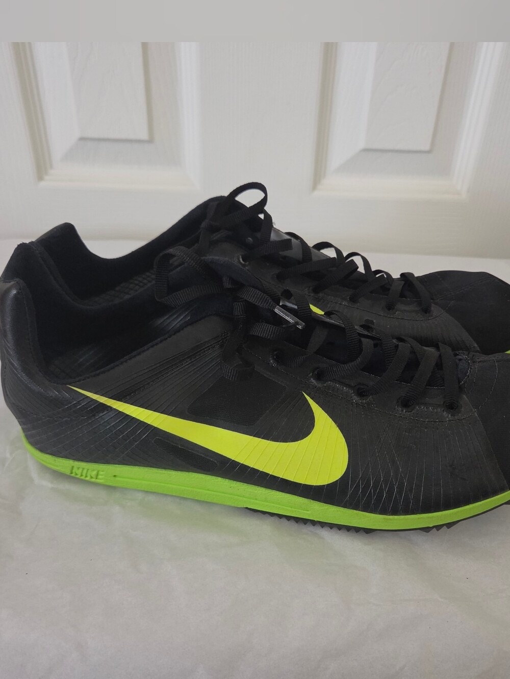 Nike Men’s Black and Volt Running Shoes